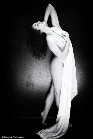 Her Stillness Dances
